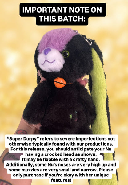 Bunny plush toy with text about product imperfections on a yellow background